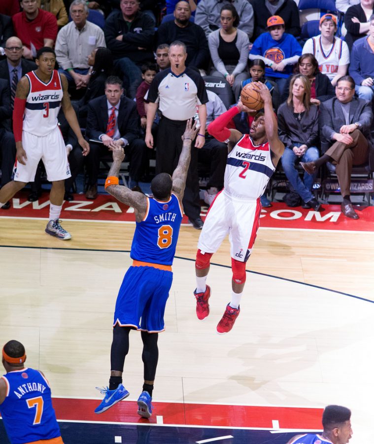 Wizards guard John Wall pulls up for a jump shot against the New York Knicks. After it was announced that Wall would miss the remainder of the season with bone spurs in his heel, Washington has won just seven of 18 games.