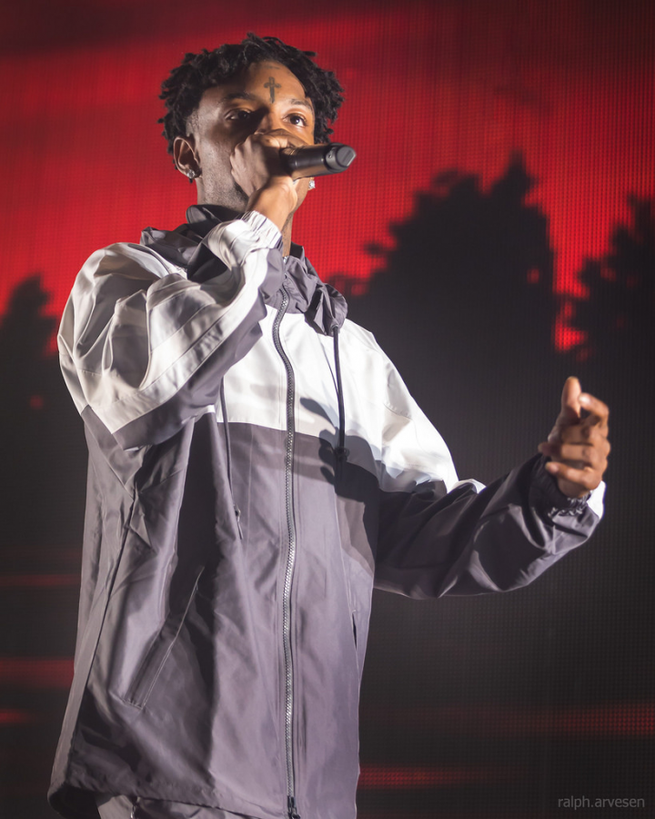 A quickshot of rapper 21 Savage as he performs at one of his many concerts in the US. His recent arrest has brought forward many followers and protests in support of his name.