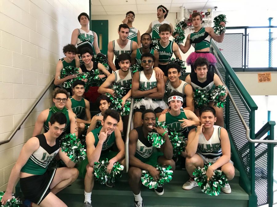 Male poms pose for a quick photo before the big performance. All the boys were excited to perform and felt happy after they left.