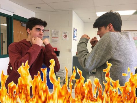 Sports editor Ned Storer (left) and staff writer Austin Muchacho (right) square up during third period Pitch class. Confrontations between the two writers are fairly frequent; several other Pitch staff members have reported the rising tensions between Storer and 
Mucchattei.