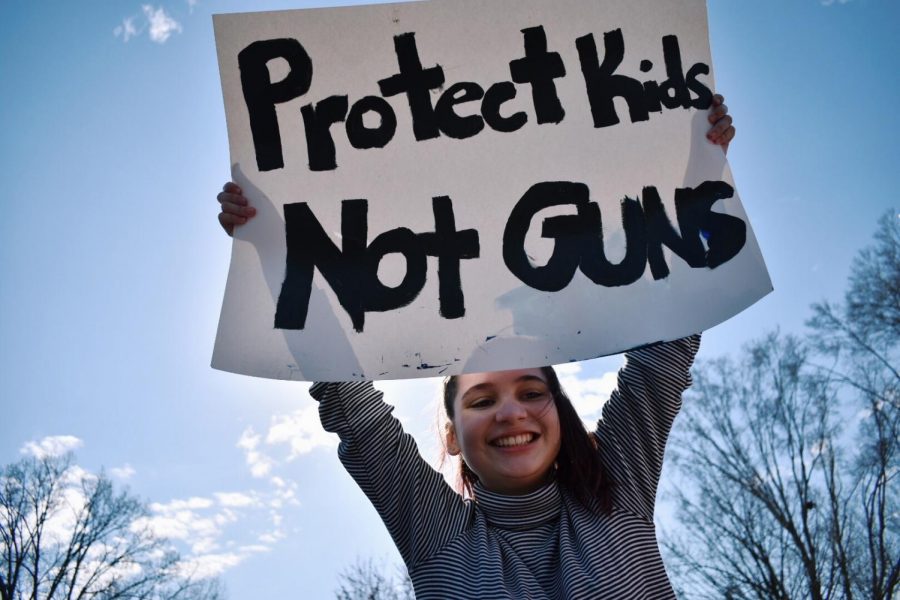 Senior Eleanor Wright at one of the school walkouts advocating for gun reform last year, she and other students received and excused absence for classes during the protest.
