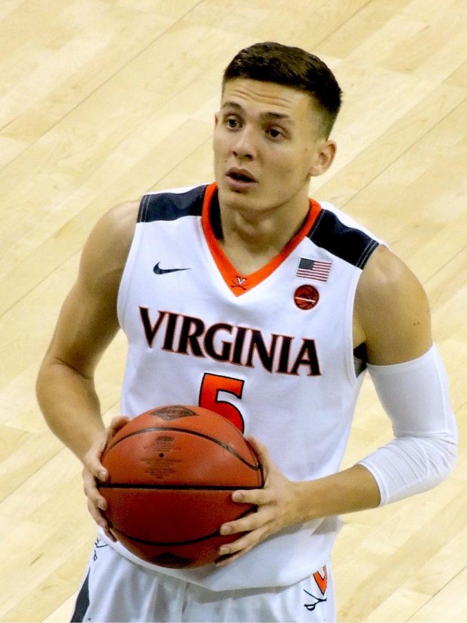 Kyle Guy nervously awaiting his three free throws that would lead Virginia to victory over Auburn, sending them to the finals in Minneapolis.