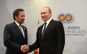 Brunei Sultan Bolkiah (left) pictured with Russian President Putin (right) at a summit in 2016. The Sultan has many connections to politicians and families of power, and is the one responsible for the new laws.