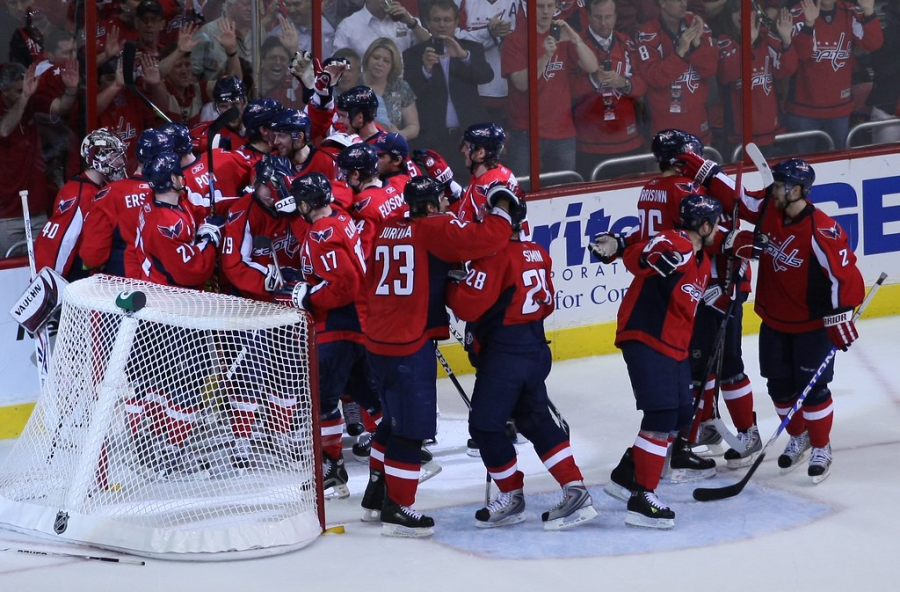 The+Capitals+celebrate+a+home+goal.+After+winning+the+Stanley+Cup+last+year%2C+the+remaining+teams+will+try+achieve+what+Ovechkin+and+the+Caps+could+not+repeat.+