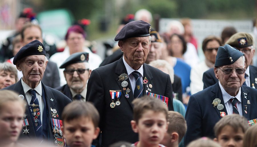 THURY-HARCOURT, FRANCE - JUNE 07: Normandy veterans attend a memorial ceremony in the Normandy town of Thury-Harcourt on June 7, 2018 in Thury-Harcourt, France. Yesterday was the 74th anniversary of D-Day and some of the handful of surviving Normandy Veterans who have made their way to France continue to commemorate the landings. The operation which saw 156,000 troops from the allied countries, including the United Kingdom, the United States and France, join forces to launch an audacious attack on the beaches of Normandy helping lead to the eventual defeat of Nazi Germany.  For the veterans travelling with groups such as the charity D-Day Revisited - which has taken the largest number of British veteran to this years commemorations, the anniversary will have extra poignance, as next year, the 75th anniversary, will be the charities final organised visit. (Photo by Matt Cardy/Getty Images)