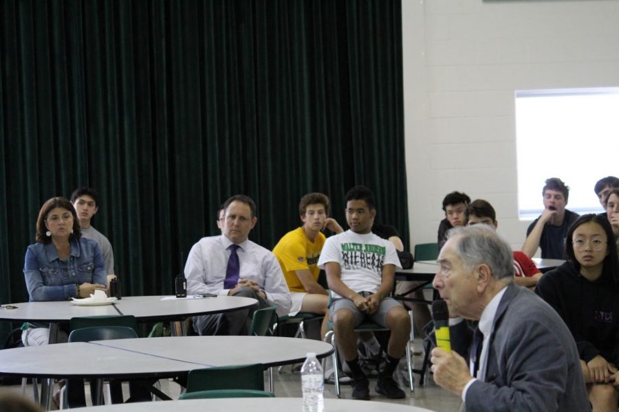 Principal Jennifer Baker and Administrator Jeff Leaman looks ahead as Mandel fields questions from the audience.