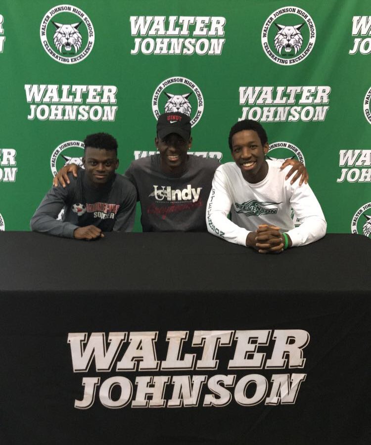 Seniors Deji Onitri (left) (Division I Soccer, Gardner-Webb University), Makel Rasheed (center) (Division II Soccer, University of Indianapolis), and Chris Manguelle (right) (Division III Football, Stevenson University) prepare to sign their letters of intent to play athletics at the collegiate level.