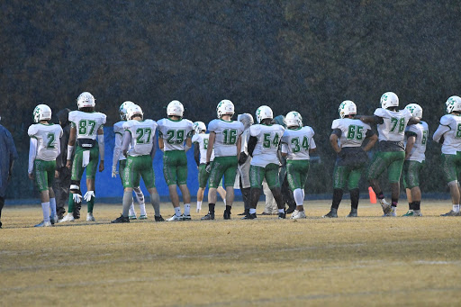 The football team lines up for another big offensive play. Despite a 4-6 record, Coach Hurd picked up his 100th win and looks for more success next season. 