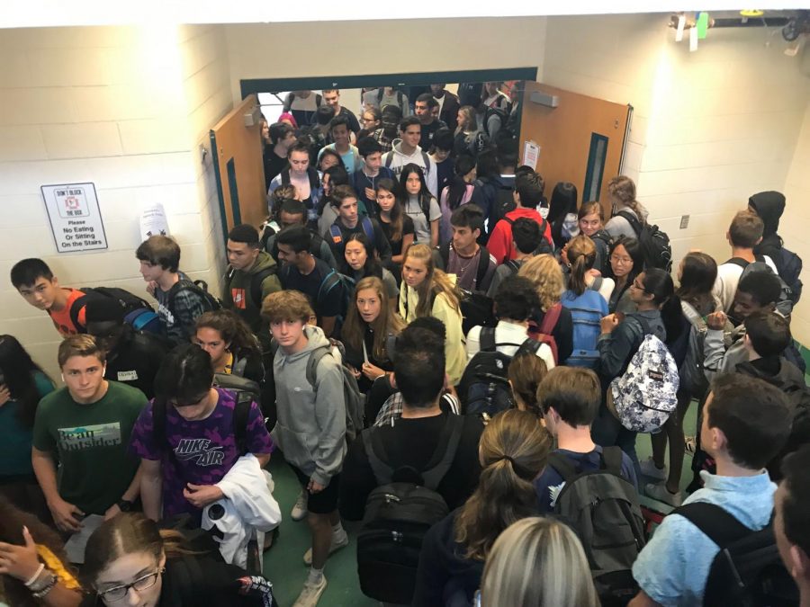 Students transition to their Period four class. Crowded hallways and stairwells have been a topic among students after the narrow stairwells have been turned into down only and more portables have been added.