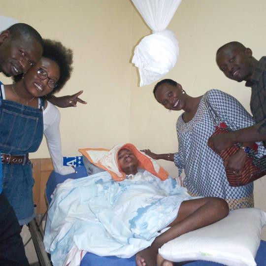 Shiima Nantulya and her mother visit a hospital in Rwanda where they meet a paralyzed boy named Trésor whos story changed Nantulyas life forever. 
(Left to right)
Rwandan nurse, Shiima Nantulya, Tresor, Carine Kaneza , Fabrice.