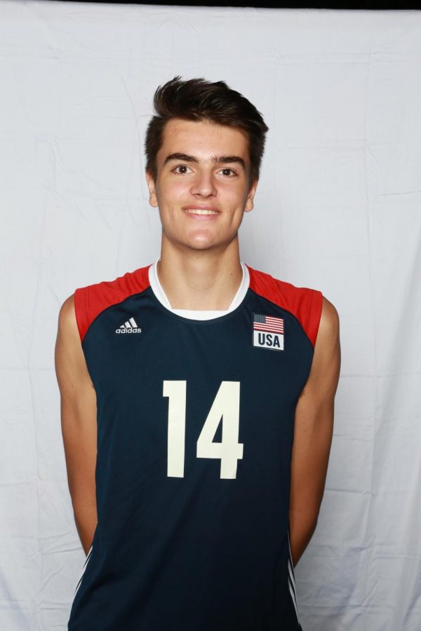 Senior+Francesco+Sani+posing+in+his+USA+volleyball+jersey.