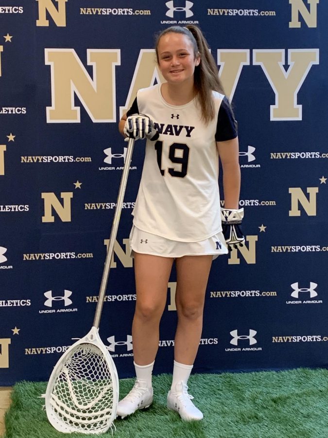 Junior++lacrosse+player+Emma+Richardell+poses+in+her+new+Navy+gear.+After+she+finishes+her+education%2C+she+will+be+in+the+US+Navy+for+five+years.