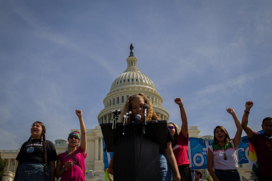 Jansi Medina-Tayac, a student activist from Blair High School, speaks in front of the Capitol.