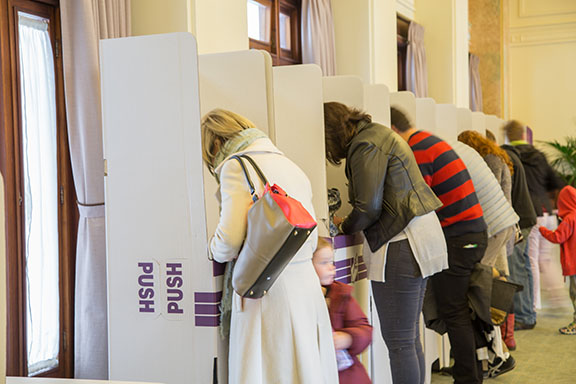 A woman casts her vote in an election. Youth voters -- people ages 18 to 24-- typically have lower turnout rates than other age demographics.