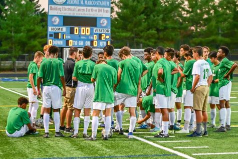 WJ boys soccer gather up for the pre-game team-talk led by Head Co-Coach Anthony Tossounian. The score ended as a 5-0 loss at Walt Whitman High School.