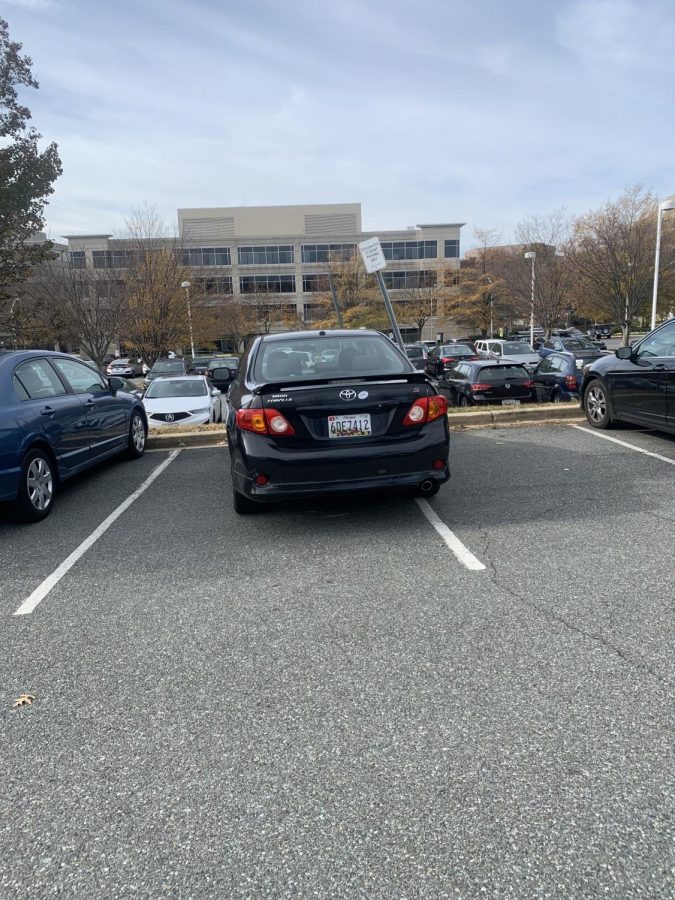 It's always nice to be able to fully open the drivers side door. Yet, this car should take it's pious parking to the Academy of the Holy Cross lot. 