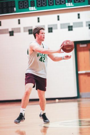 About a week before their first game, senior Josh Forburger working his way throught the drills at practice he strengthen the growth of himself and the team.