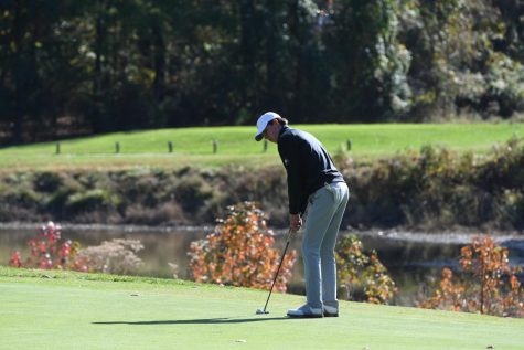 Junior Jake Griffin attempts a putt on his way to the state championship title. Griffin became the first WJ golfer to ever win the individual state championship.