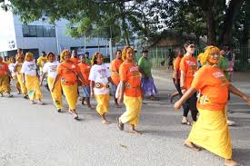 Women in the Solomon Islands march in parade for 16 days of activism against gender based violence.