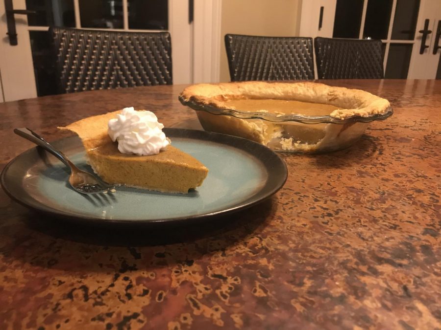 Step 4: Cut a slice and top it off with whipped cream. There you go, the perfect pumpkin pie!