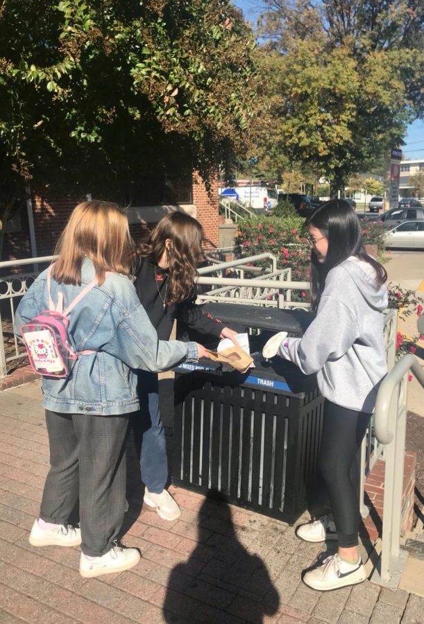 (From left) Jenny McIntyre, Chloe Farago, and Daniella Mil show their dedication to keeping their community clean and enjoyable for the public.