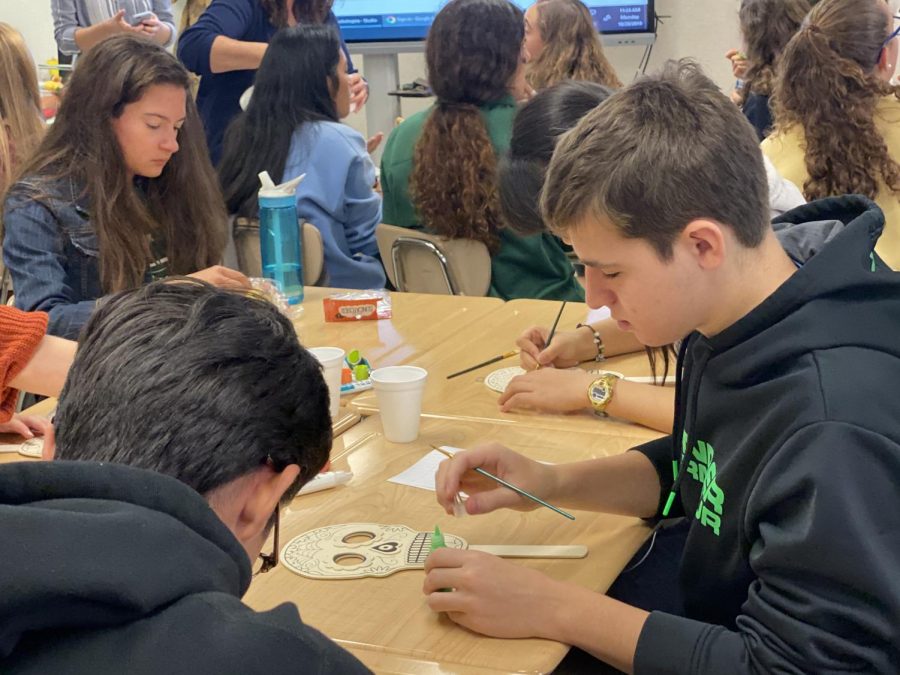 Spanish Honor Society students work on an arts and crafts project. The group has tried to emphasize cultural activities to enhance the experience of members. 