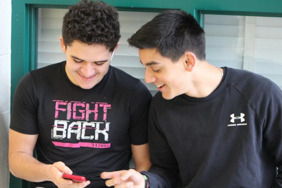 Juniors Arun Sen and Enzo Molina enjoy listening to music and frequently bond over each others music taste.