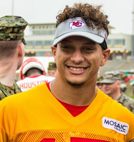 Members of the 139th Airlift Wing, Missouri Air National Guard, pose for a photo with Patrick Mahomes, quarterback for the Kansas City Chiefs football team, at the Chief’s training camp in St. Joseph, Mo., Aug. 14, 2018. The Chiefs hosted a military appreciation day on their final day of training. (U.S. Air National Guard photo by Master Sgt. Michael Crane)