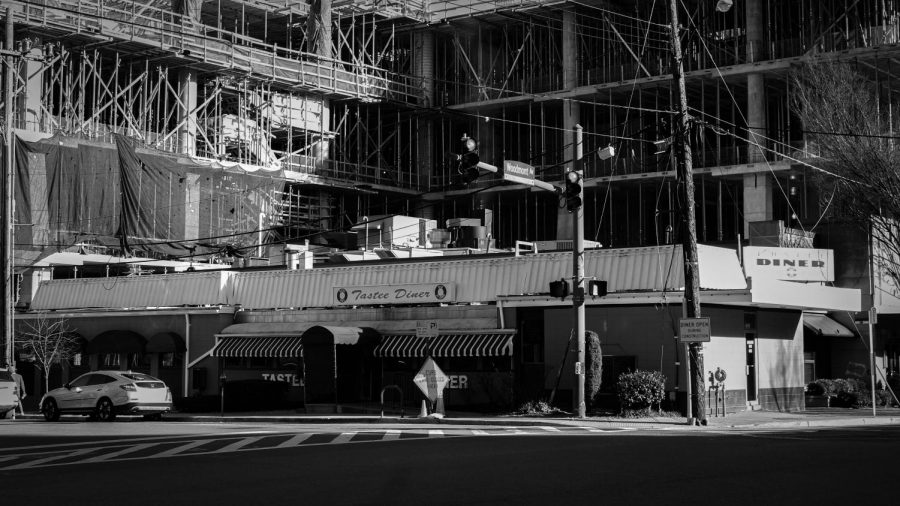 The famous Tastee Diner appears dwarfed under the recent construction of Marriotts new headquarters. Originally planning to close after the construction began, the Tastee Diner has remained open throughout the work process.
