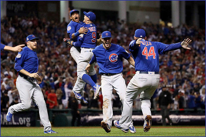 The+Cubs+celebrate+after+overcoming+a+3-1+series+deficit+to+win+their+first+World+Series+in+over+100+years.+This+classic+game+seven+in+Cleveland+is+among+some+of+the+top+sports+games+that+fans+should+watch+again+while+stuck+at+home.