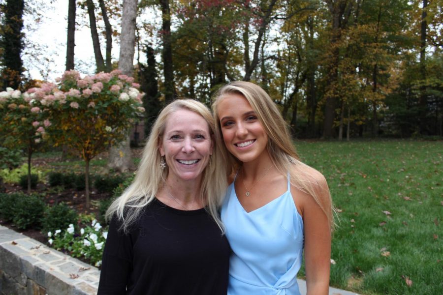 Senior Brooke Haines, right, stands next to her mother, Amy Chamberlin, a nurse on the front lines of the fight against the coronavirus.