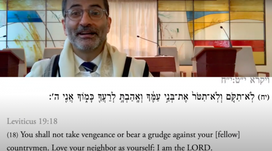 Rabbi+Gil+Steinlauf+delivers+his+Rosh+Hashanah+sermon+over+Zoom.+In+order+to+save+time+and+technical+difficulties%2C+Steinlauf+pre-recorded+his+sermon%2C+which+also+allowed+for+the+texts+he+referenced+to+show+up+on+the+screen.