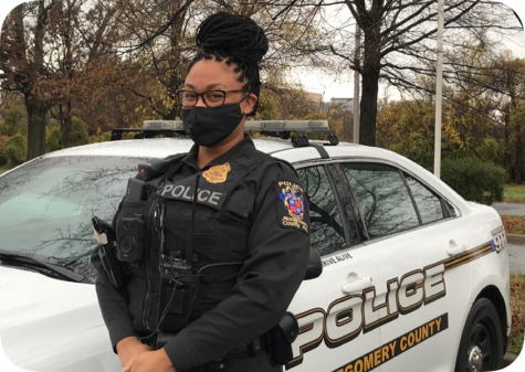Officer Shate Jackson, WJ’s School Resource Officer, stands  outside of the school. The necessity role, along with that of the other SROs, is currently being debated by the Montgomery County Council