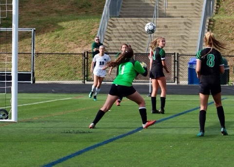 Senior goalkeeper Danielle Nevett gets ready to knock the ball away in her game against Winston Churchill. Nevett hopes to play Churchill once more if COVID conditions allow it.