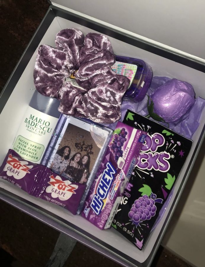 A purple themed gift basket. Not only is it easy to make, but its also creative and pleasing to the eye.