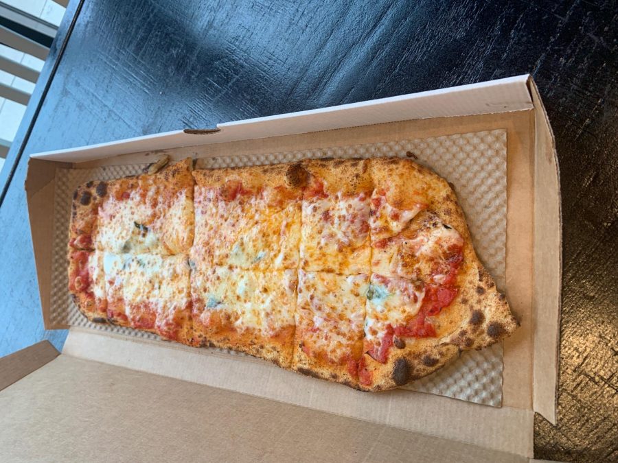 &Pizza, located in Pike and Rose, offers easily customizable and fresh slices - or squares - of pizza. One of its most disguising factors was the stretch of its mozzarella cheese. 