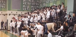Students fill the stands as boys basketball gets a big win over Wheaton. These crowds and great atmospheres created special moments for athletes.