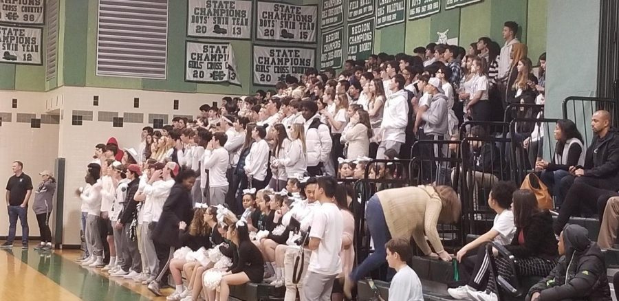 Students+fill+the+stands+as+boys+basketball+gets+a+big+win+over+Wheaton.+These+crowds+and+great+atmospheres+created+special+moments+for+athletes.