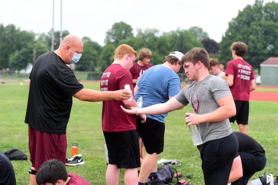 High school coach does his best to keep his players safety in mind while also being able to practice.