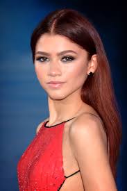 Zendaya at the Spider-Man: Homecoming premiere (2019). Zendaya stars as Rue in Euphoria, and historically won an Emmy for her performance in the show.