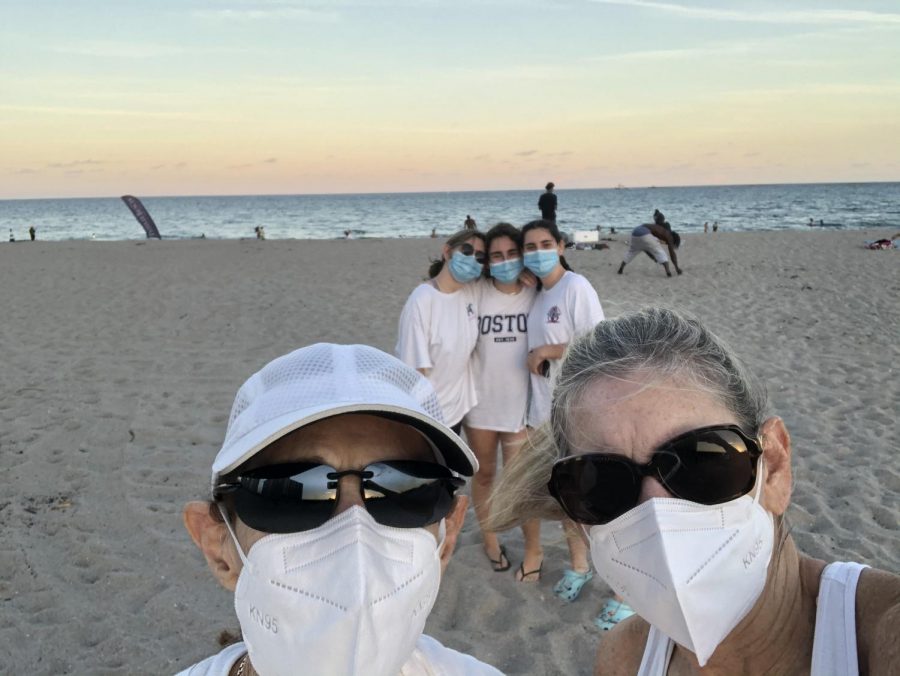 Junior+Becca+Scherr+and+her+family+went+to+Florida+for+Winter+Break.+They+are+kept+their+masks+on+and+a+social+distance+from+others+for+the+picture.+Even+though+we+cant+do+much+because+of+Corona.+I+am+still+hoping+for+a+little+tan%2C+Scherr+said.