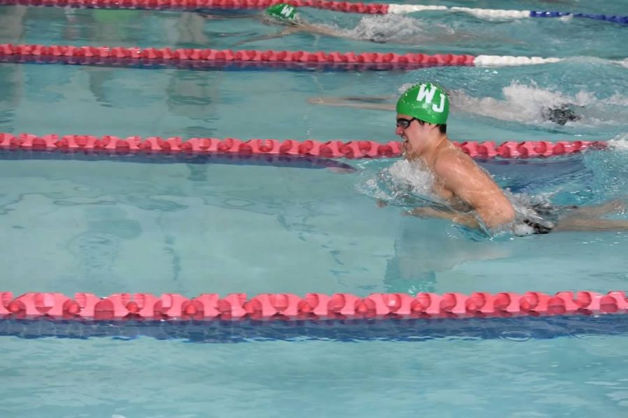 Senior+Henry+Bagshaw+finishes+his+last+lap+at+a+Montgomery+County+swim+meet.+An+impressive+and+decorated+high+school+career+for+Bagshaw+is+coming+to+an+end.