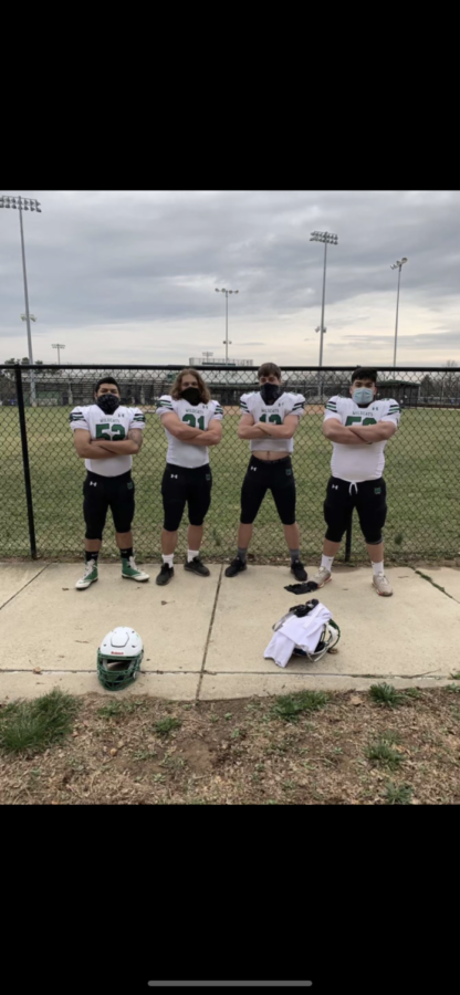 After being named captains for the 2021 football season, WJ players Anthony Villacis, Danny Ticktin, Will Gardner and Chris Ramirez gather to take a photo. They will serve as captains for the shortened two game season.