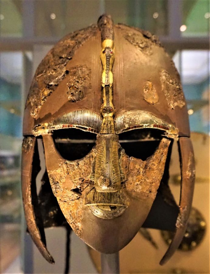 The new Netlix film The Dig follows the archeological efforts to uncover the Anglo Saxon burial mounds at Sutton Hoo. Pictured is one of the most significant discoveries of the site, an Anglo Saxon Kings helmet.