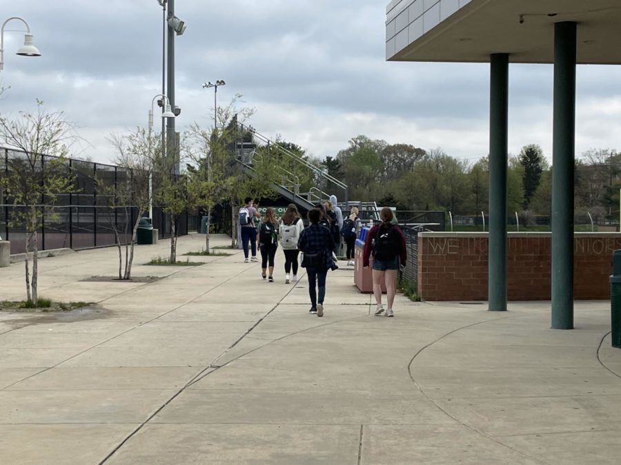 WJ students walk to the school stadium to have lunch outdoors on April 12. The experience of returning to in-person learning has been unique to every person.