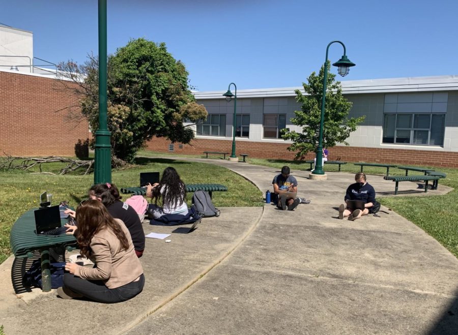 As AP tests start taking place in the building, classes need to be moved to other classrooms. With the weather warming up, The Pitch class decided to have their class outside due to an AP test taking place in their classroom.