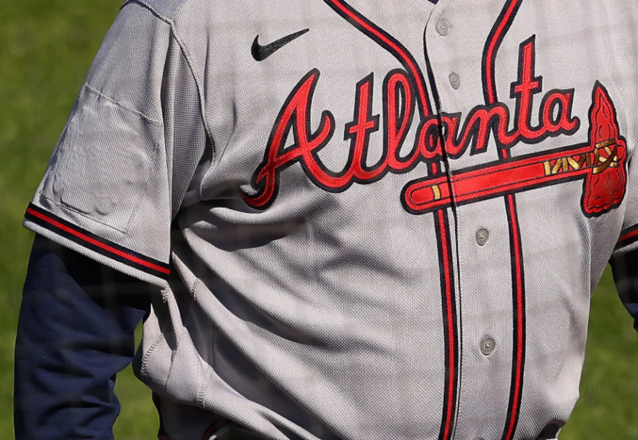 The 2021 All-Star Game patch is still slightly visible on the sleeve of Braves manager Brian Snitkers jersey.