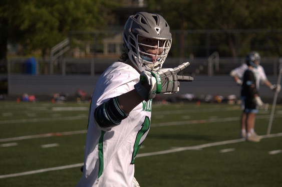 Luke Dentel prepares for a faceoff on the wing in a home game against Wooton HS on May 14.