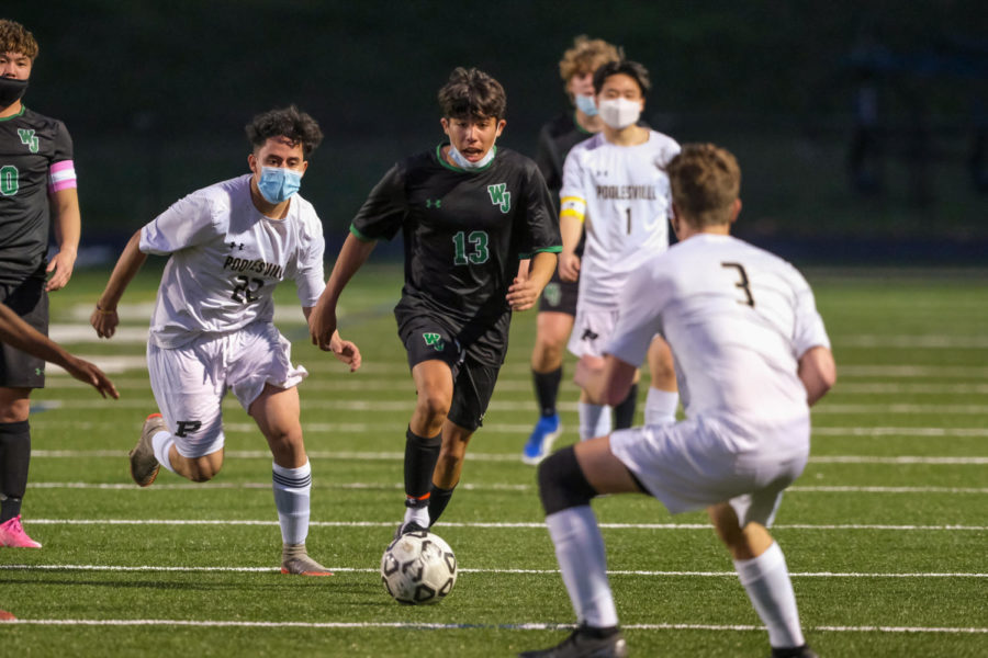 Sophomore Thomas Poliseno dribbles the ball upfield on a counterattack. The Wildcats offensive attack was relentless against Poolesville.