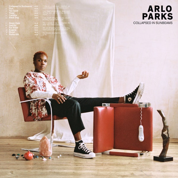 Arlo+Parks%E2%80%99s+debut+album%2C+%E2%80%9CCollapsed+in+Sunbeams%2C%E2%80%9D+was+released+January+29%2C+2021.+Described+as+%E2%80%9Ckind+of+like+bedroom+pop+mixed+with+a+little+bit+of+indie+folk+and+a+little+bit+of+R%26B%E2%80%9D+%28Morning+Edition%29%2C+%E2%80%9CCollapsed+in+Sunbeams%E2%80%9D+has+been+praised+for+Parks%E2%80%99s+revealing%2C+vulnerable+and+relatable+lyrics.